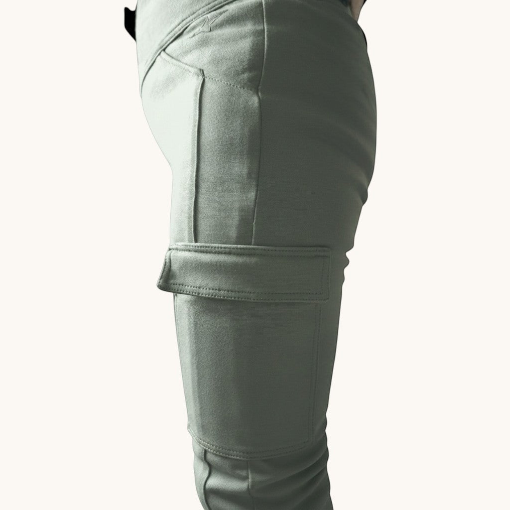 VelvetMoto sage green moto leggings with cargo pockets and a slim fit.